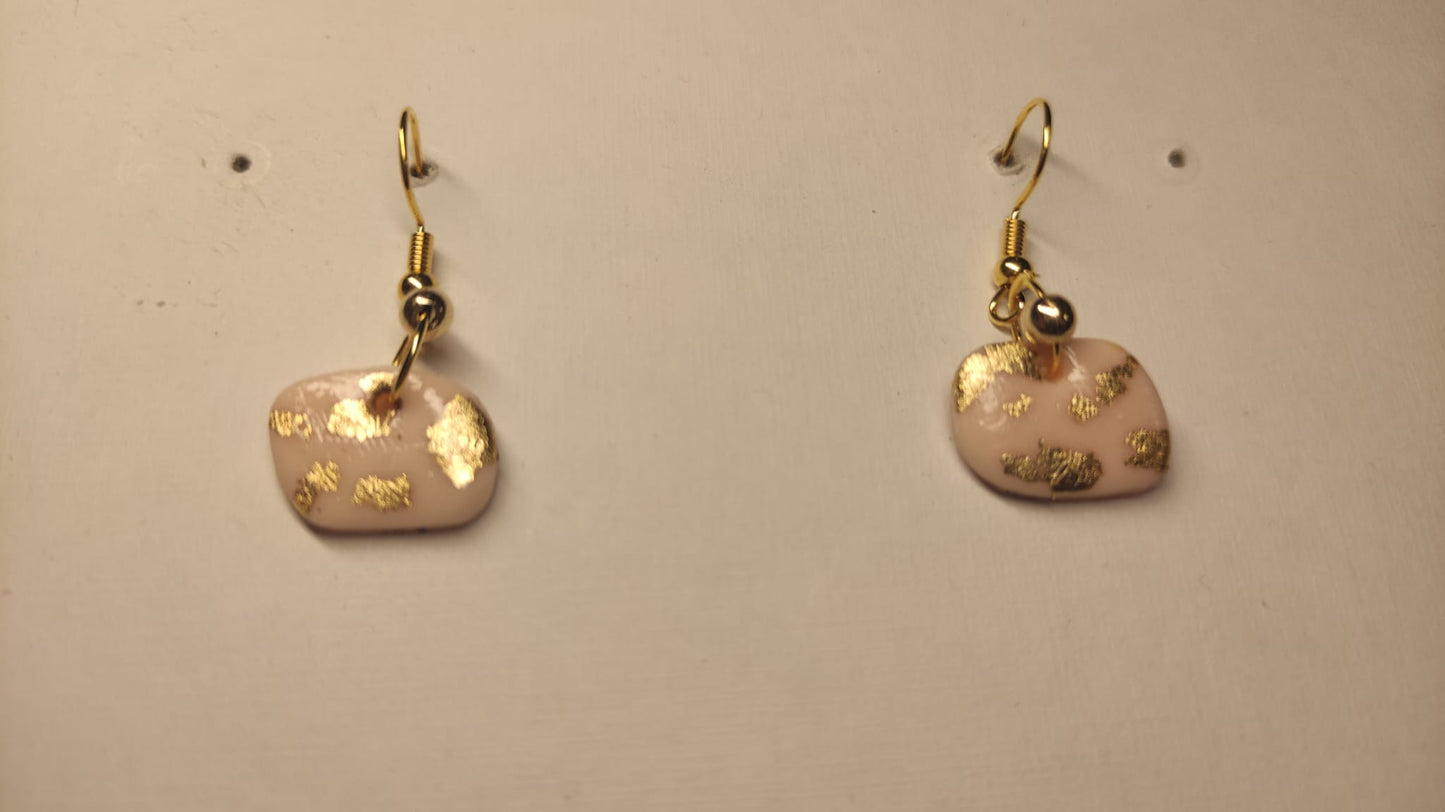 Roze hangers met goud