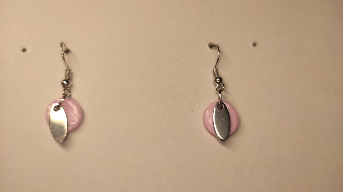 Roze rondje met zilverkleurig juweeltje