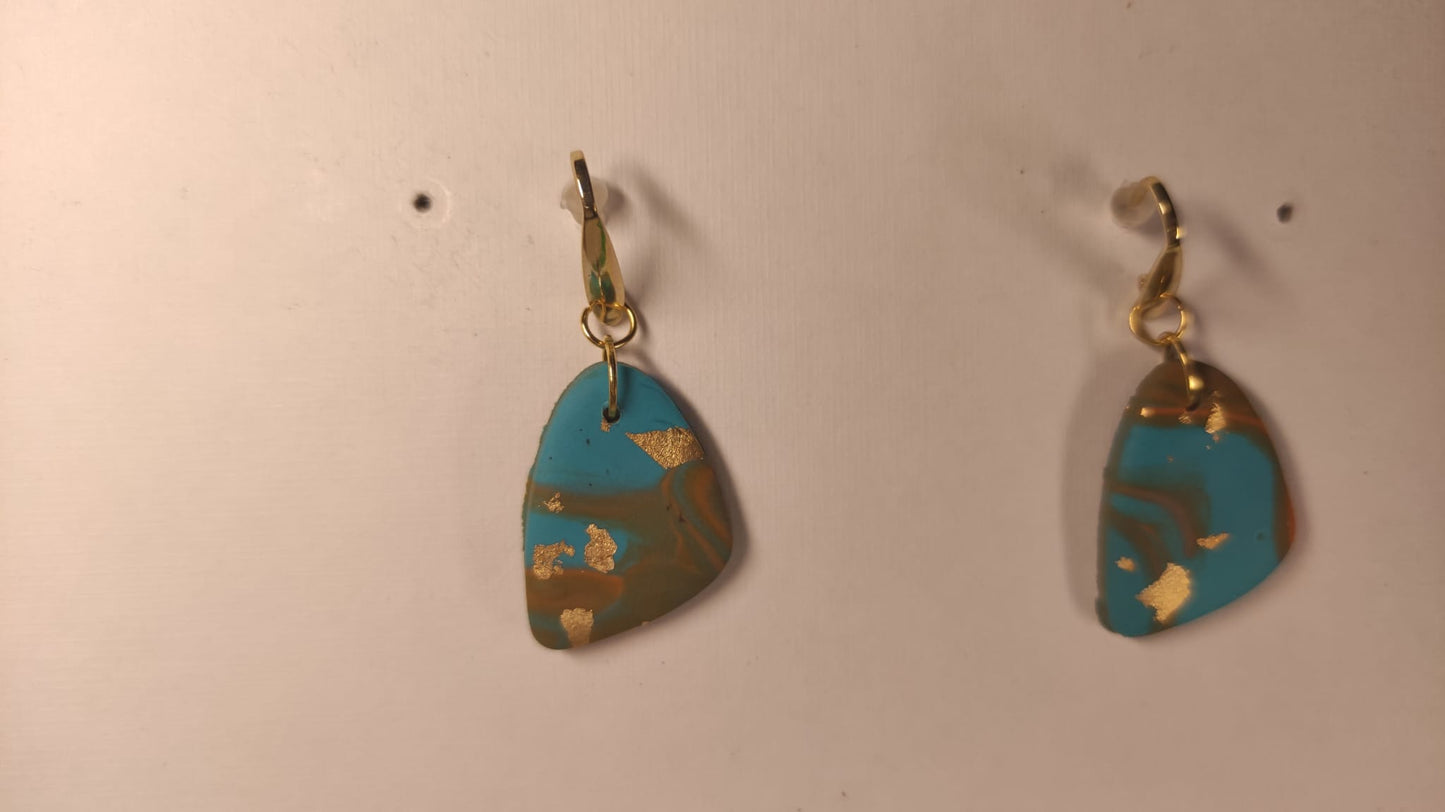 Gemarmerde hangers met blauw en goud