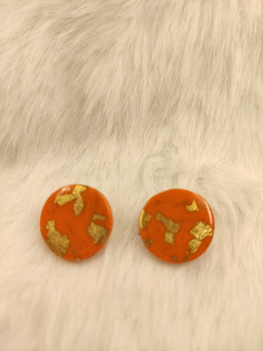 Oranje stekers met goud
