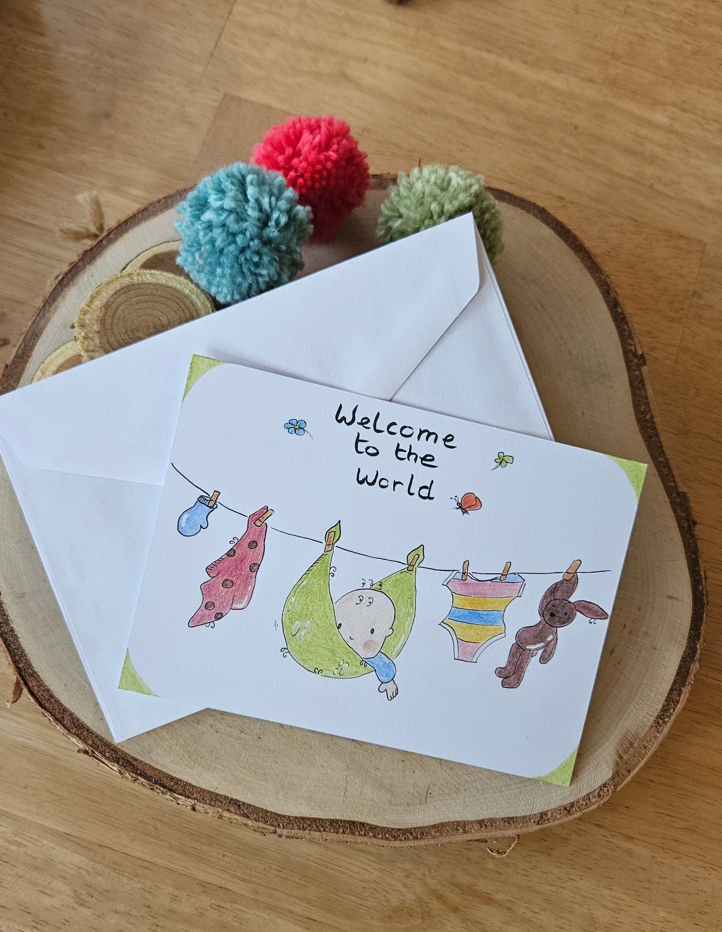 Geïllustreerde geboorte wenskaart wasdraadbaby