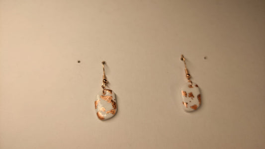 Witte hangertjes met rosé goud