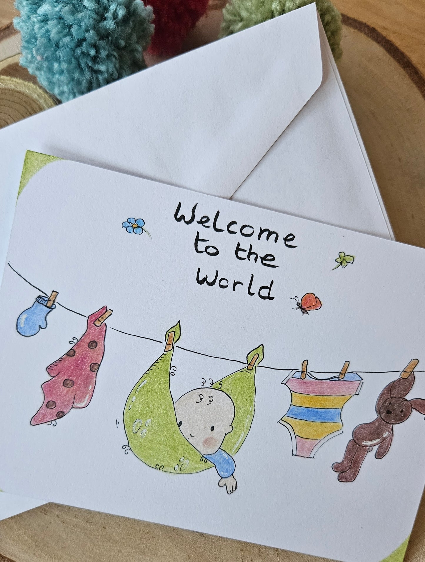 Geïllustreerde geboorte wenskaart wasdraadbaby