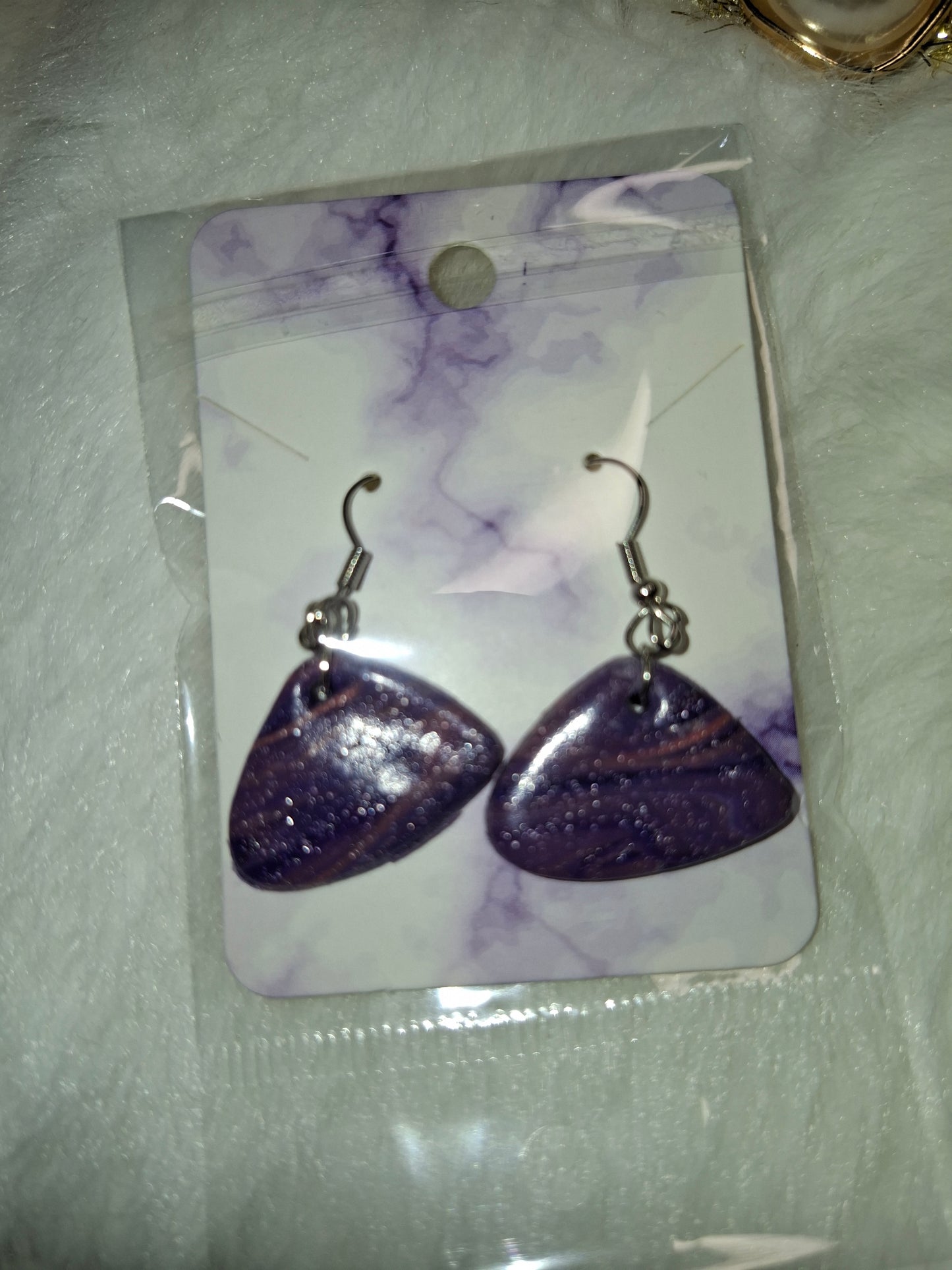 Paarse hangertjes met glitters