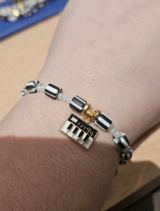 Enkel- of armbandje pianofan