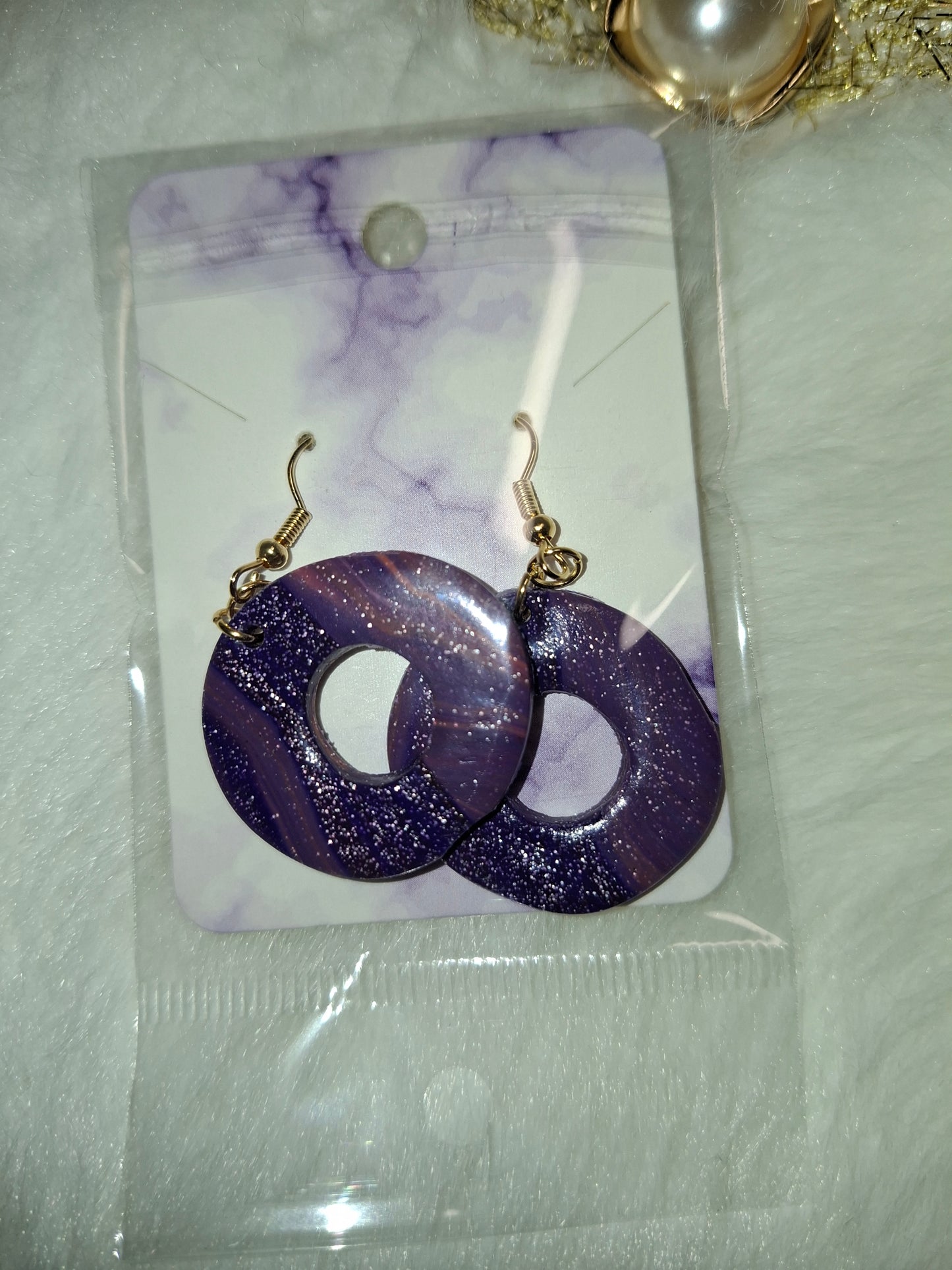 Paarse glitter donuts