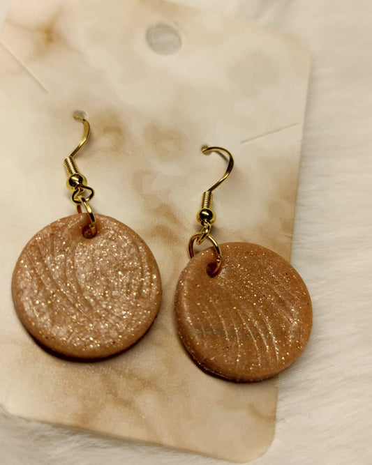 Beige rondjes met gouden spikkels