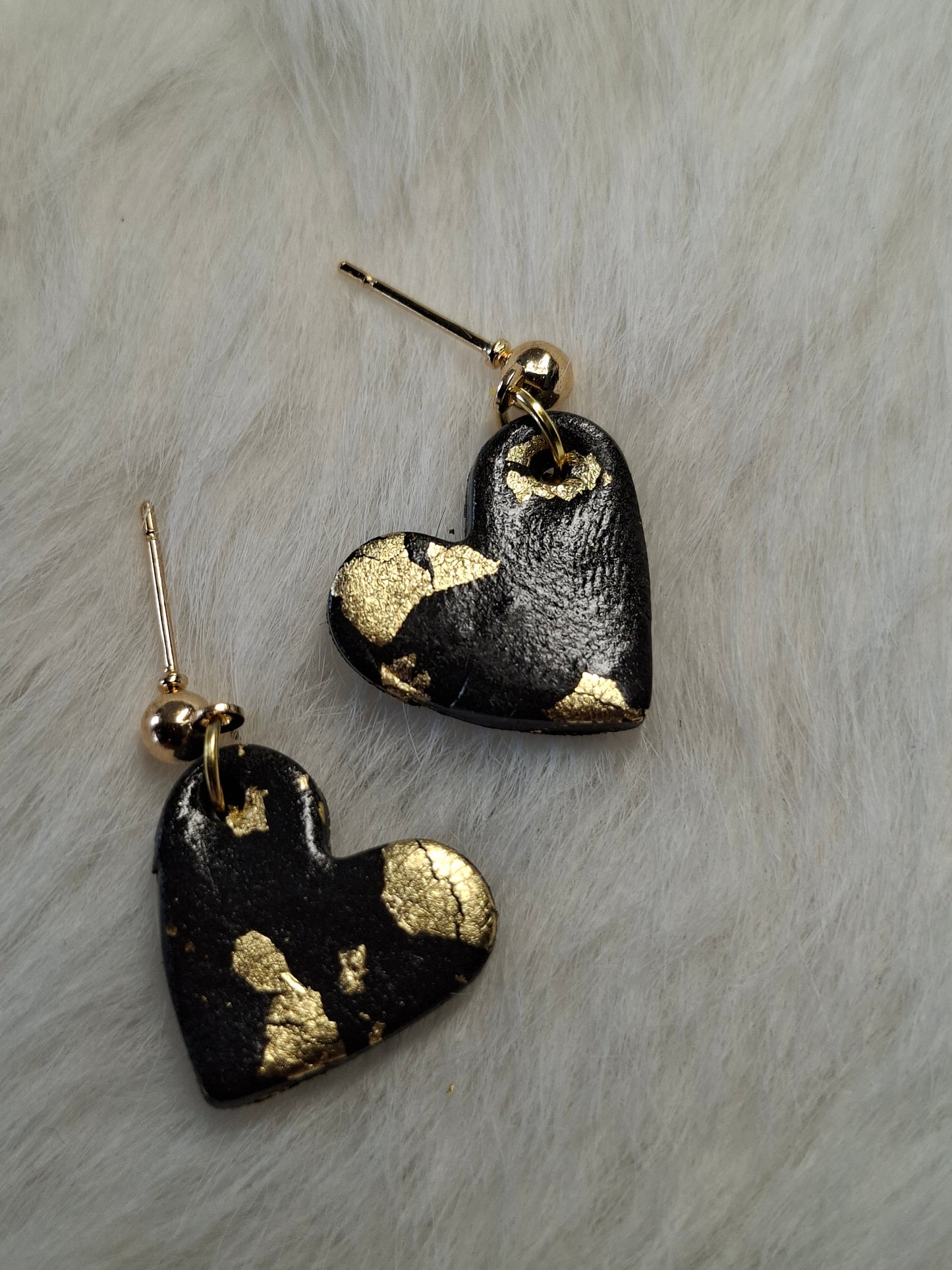 Zwarte hartjes met goud