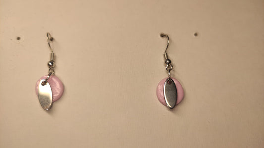 Roze rondje met zilverkleurig juweeltje